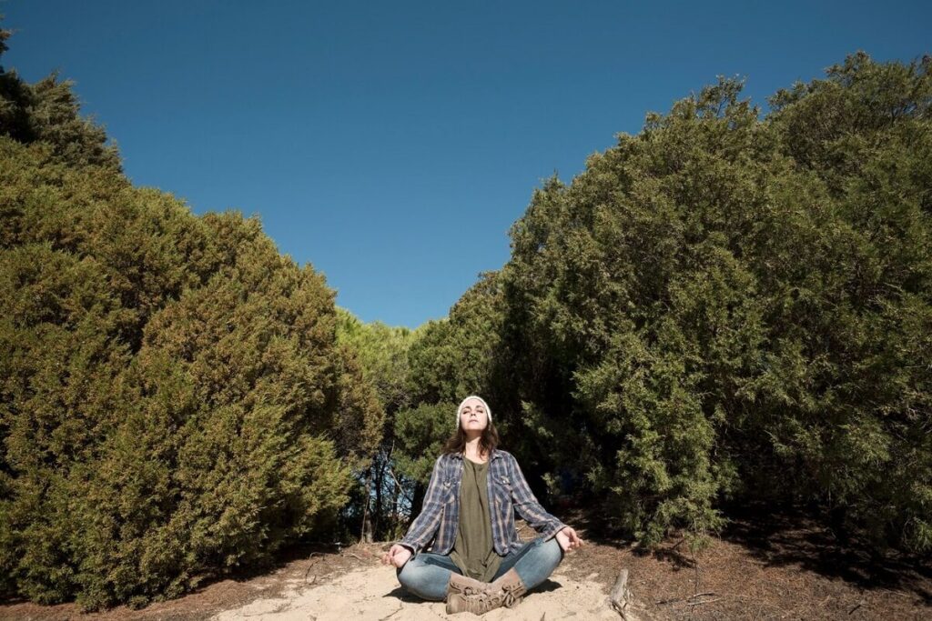 woman meditating nature 1