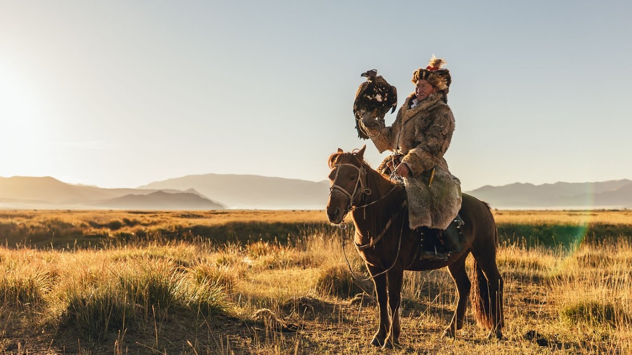 Solo horse trekker on a Mongolian gaited horse covering long distances on the steppe.