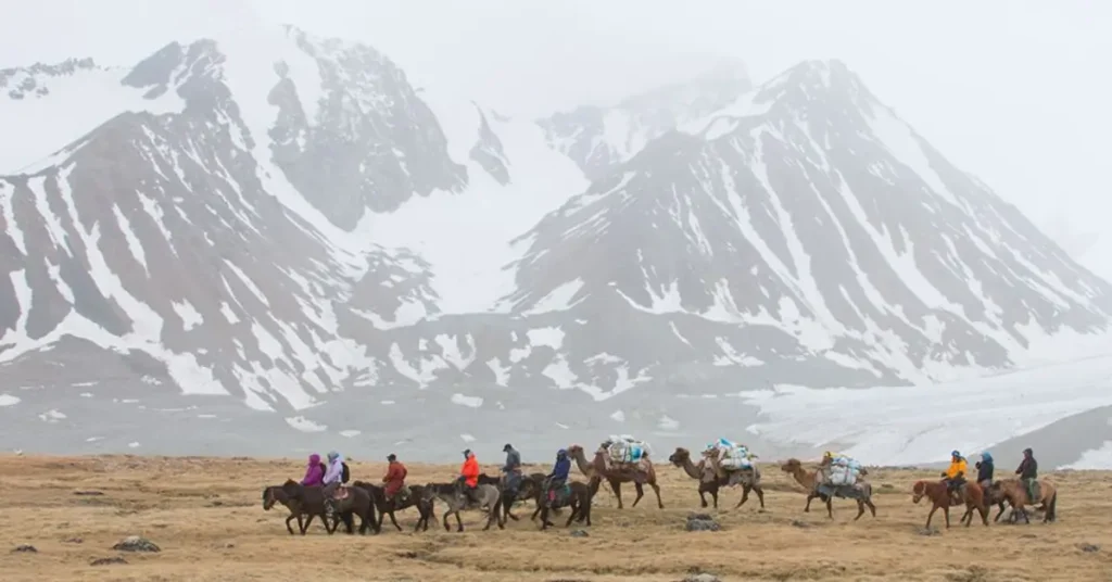 Riding Through Snow-Covered Valleys