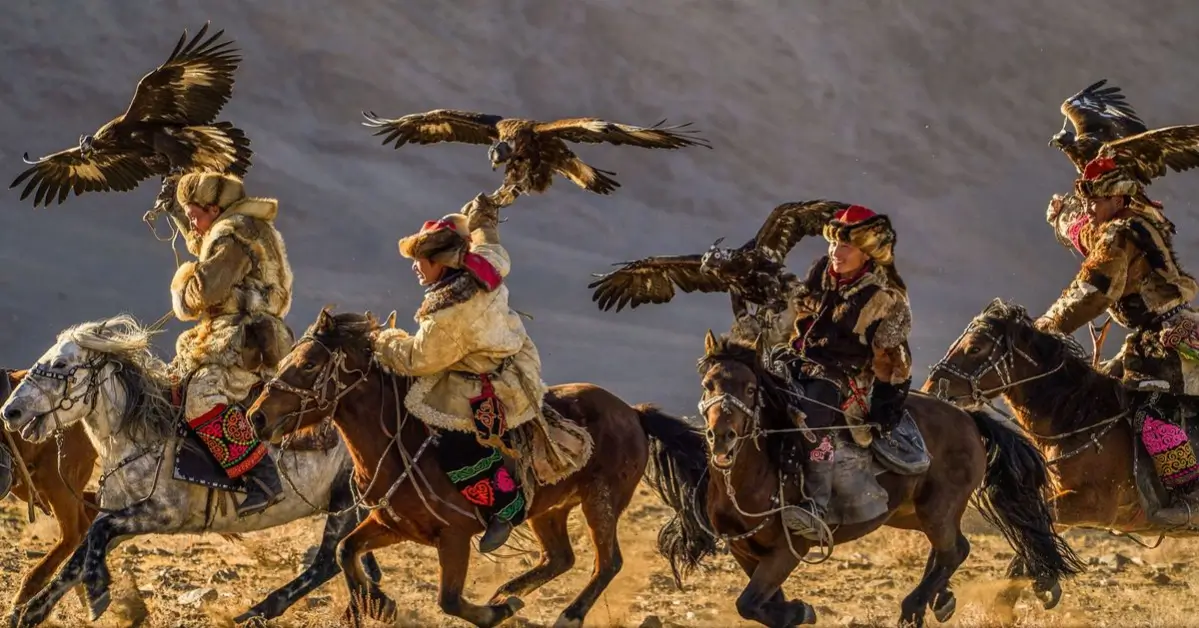 Kazakh berkutchi in traditional fur coat at the Altai Eagle Festival in Bayan-Ölgii.